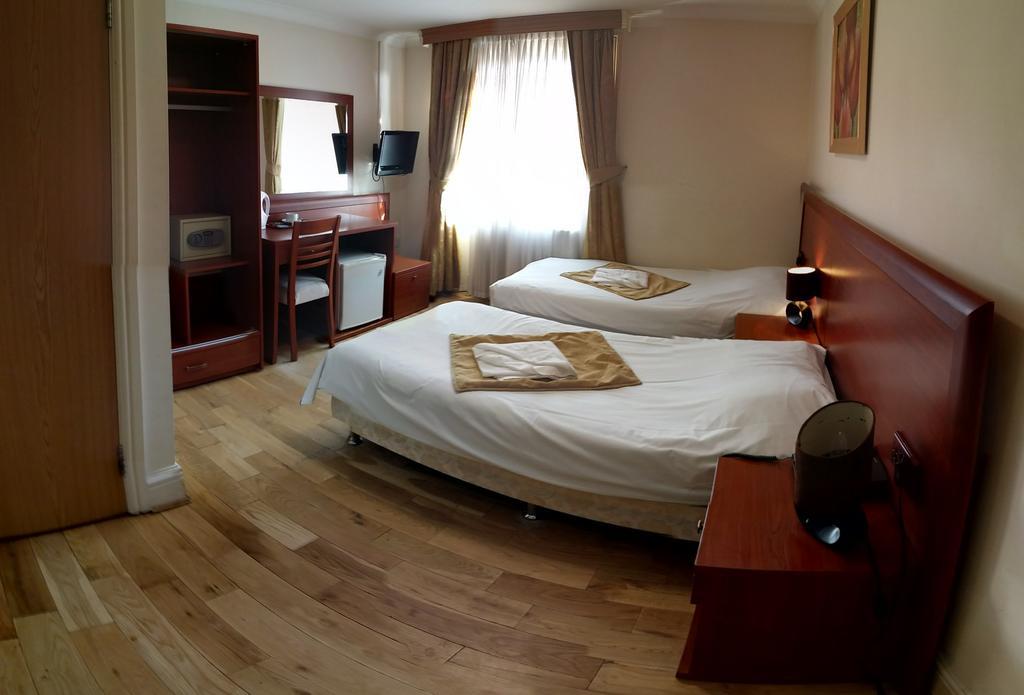 Corner House Hotel London Zimmer foto