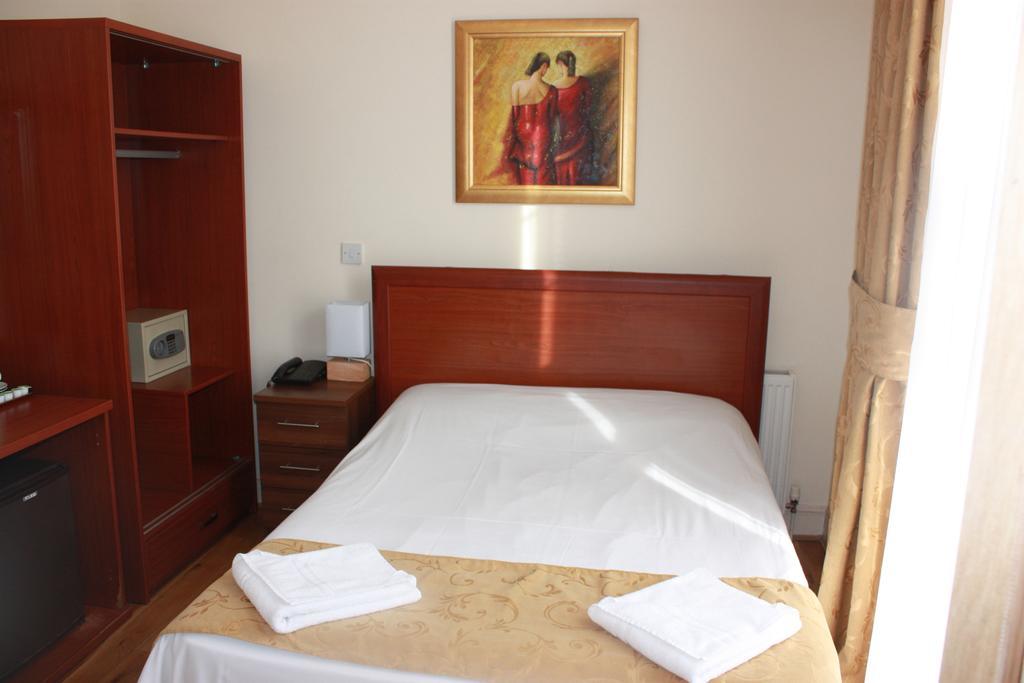 Corner House Hotel London Zimmer foto