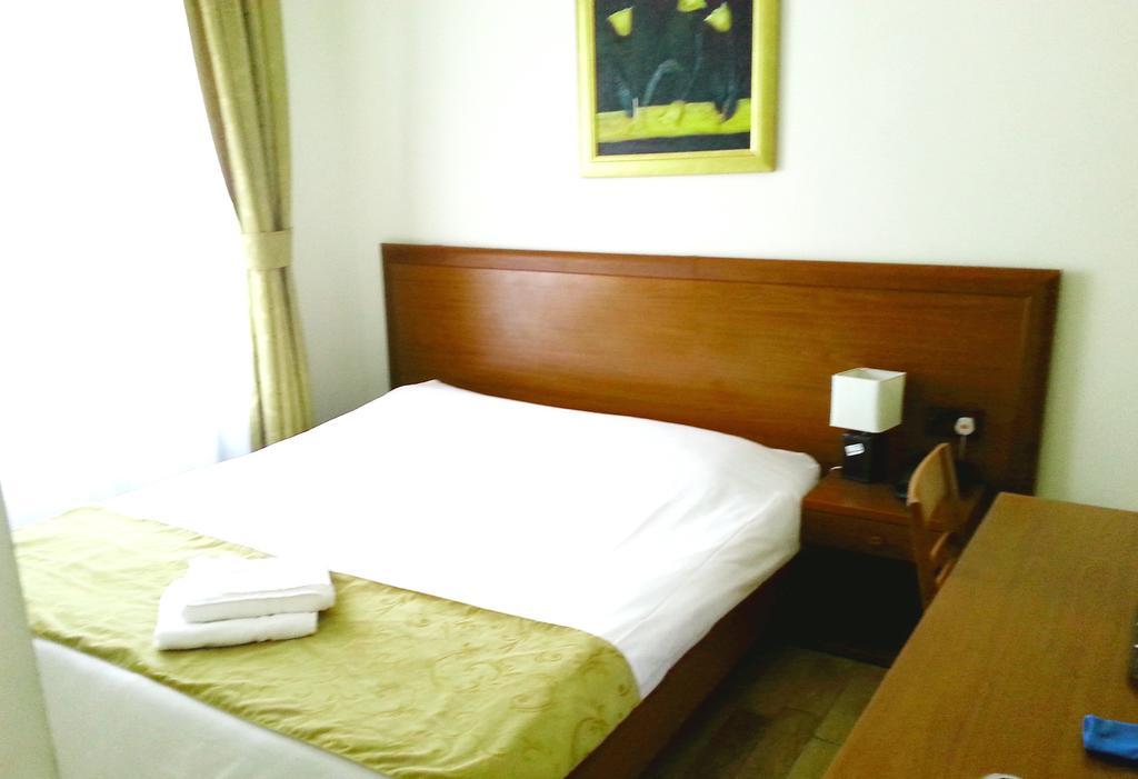 Corner House Hotel London Zimmer foto