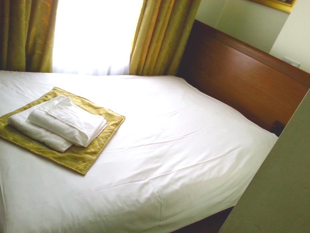 Corner House Hotel London Zimmer foto